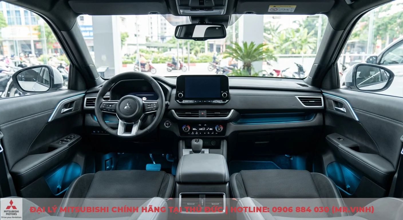 Nội thất Mitsubishi Xforce 2026: Đánh giá chi tiết khoang lái và tiện nghi 3 Khoang nội thất Mitsubishi Xforce 2026 tiện nghi với đèn ambient light xanh, màn hình, điều hòa tự động, cửa gió hàng ghế sau